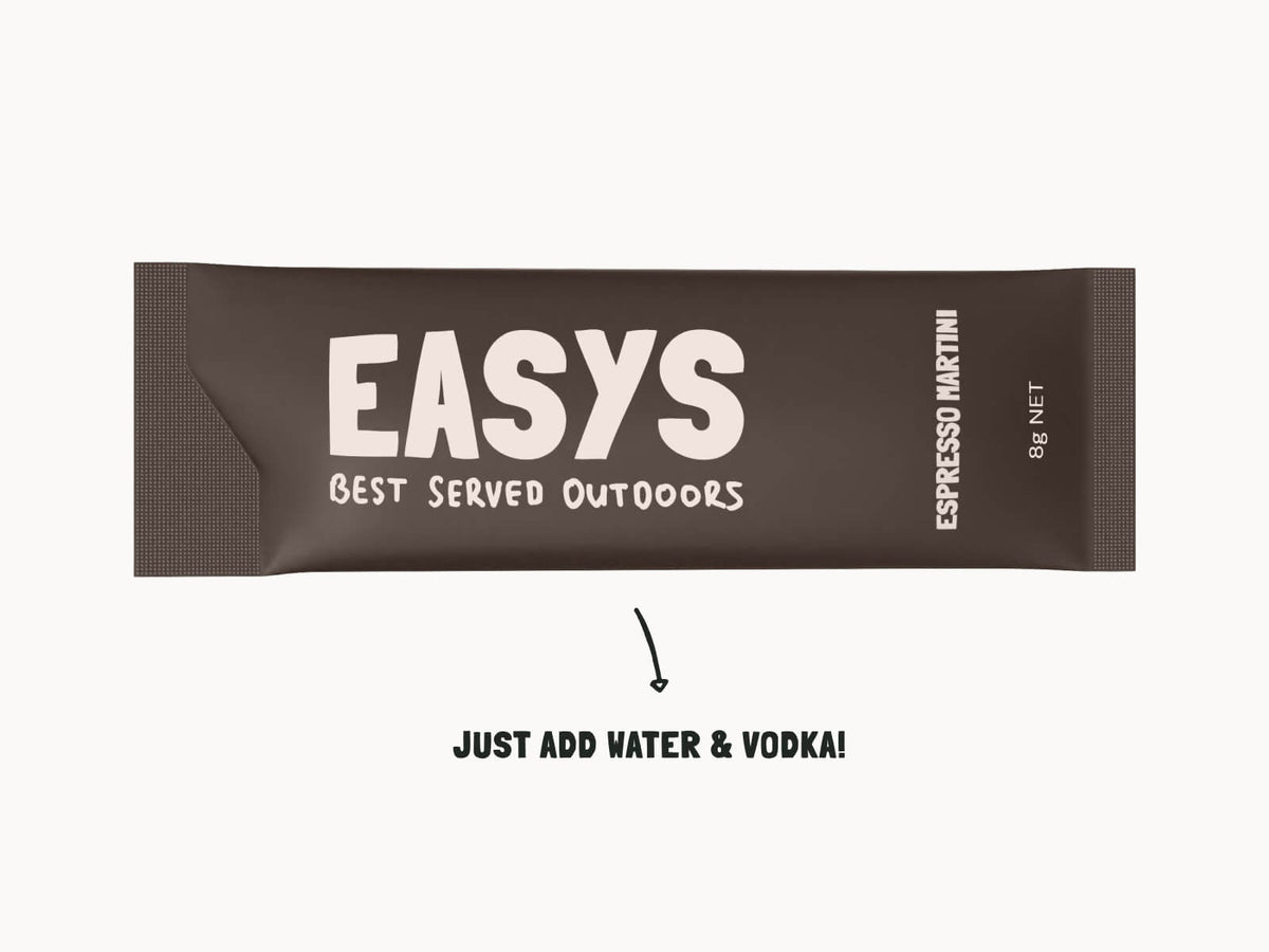 Single Easys Espresso Martini powdered cocktail mix sachet, on it's side on a white background. 